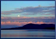 A spring moon rising over Saturna Island, North Pender Island